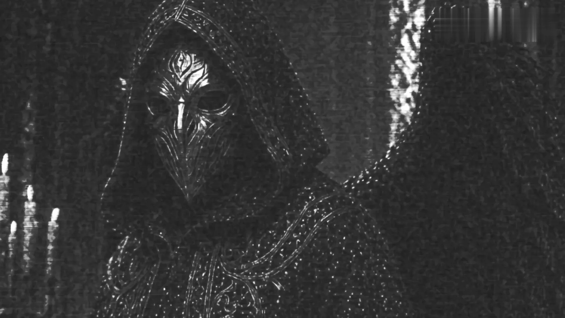A keeper of the covenant in an ornate mask and hood.